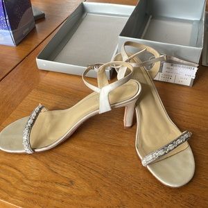 Off white silk sandal with crystal beading.